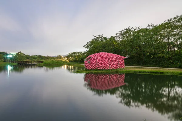 A quiet wetland park at dusk. Pink bubble decorations. Yuemei man-made wetland ecological park. Taoyuan City, Taiwan