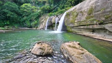 Small but beautiful waterfalls, clear streams, big rocks and green trees. Lingjiao Waterfall, Pingxi District, New Taipei City, Taiwan