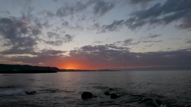Dynamic Fast Moving Clouds Red Sunset Rocky Coast View Sea — Stok video