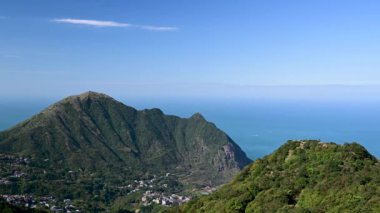 White clouds in the blue sky. People feel comfortable, free and at peace. The scenery of mountains and seas in Ruifang, New Taipei City. Taiwan