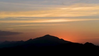 At dusk, dynamic clouds. People feel romantic, comfortable, free and peaceful. The scenery of mountains and seas in Ruifang, New Taipei City. Taiwan