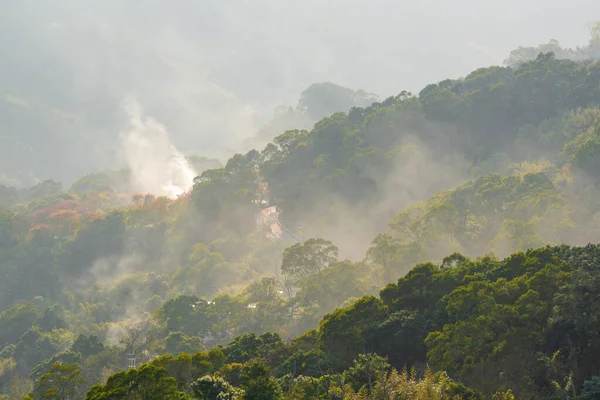 stock image In the green valley, white clouds are constantly emerging. Hakka-style mountain city scenery, Dahu Township, Miaoli County. Taiwan