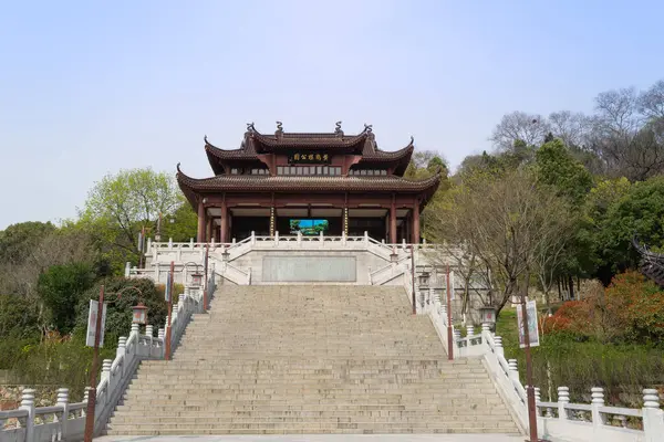 A horizontal plaque with the name of the park is located at its entrance. Yellow Crane Tower Park is a famous historical and cultural attraction, Wuhan.