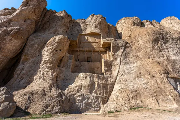 Majestic tombs of Persian kings carved into the hard rock. These ancient tombs are a testament to the grandeur of the Persian Empire, Naqsh-Rostam, Iran.