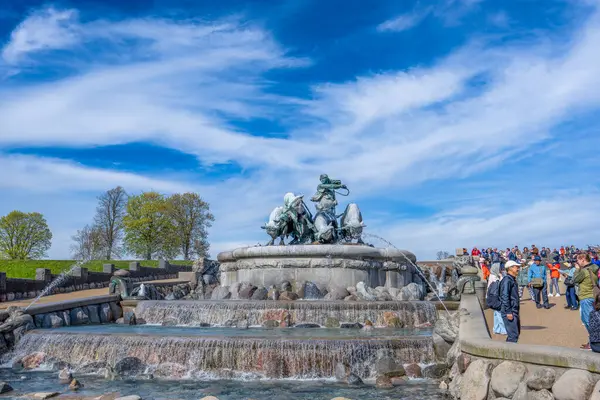 stock image Copenhagen, Denmark - April 29, 2024: The majestic Gefion Fountain under a blue sky, depicting Norse mythology.