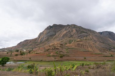 A stunning view of the rugged terrain and unique rock formations of Isalo National Park. The park's geological formations date back to the Jurassic period. Isalo National Park, Madagascar. clipart