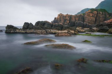 Jiufen, Tayvan 'da sakin bir sahil kaya oluşumu sakin bir okyanus zeminine karşı eşsiz doku ve desenler sergiliyor..