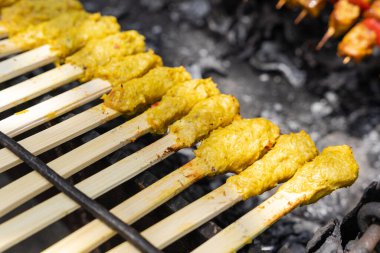 Plates of prepared ingredients for a Balinese cooking class, vertical