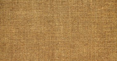 Kırsal keten kumaş üzerindeki doğal tuval dokusu