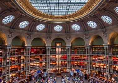 PARIS, FRANCE, OCTOBER 20, 2022 : Oval reading room in National Library, Richelieu site, Paris, france, built by architects Jean-Louis Pascal. and Alfred Recoura, from year 1897 to year 1932 clipart