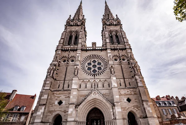 stock image MOULINS, ALLIER, FRANCE, APRIL 11, 2022 : exteriors and architectural decors of Cathedral of Our Lady of the Annunciation, by various architects, from 15 th to 19th century