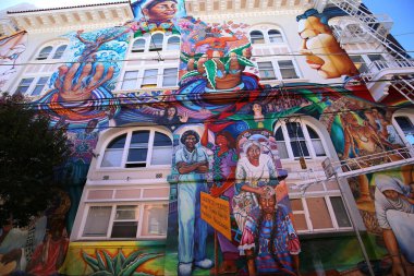 SAN FRANCISCO, CALIFORNIASEPTEMBER 17, 2014  Mexican murals painted walls of Casa de las mujeres, near Balmy Alley, september 17, 2014,  in  San Francisco, California, USA clipart