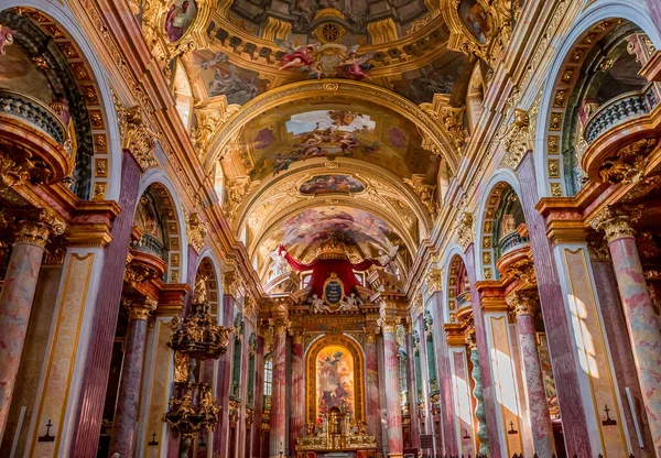stock image VIENNA, AUSTRIA, MAY 25, 2023 : interiors, frescoes and architectural details of theJesuit church