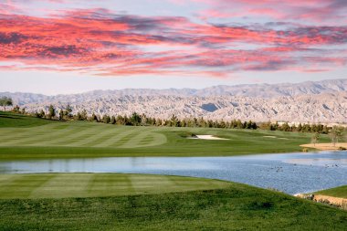 golf course at sunset  in palm springs, california, usa
