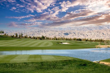 golf course at sunset  in palm springs, california, usa