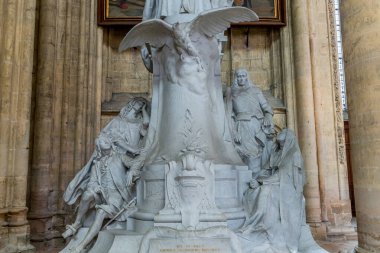 MEAUX, FRANCE, APRIL 18, 2023 :  Statue of bishop Bossuet, Saint Etienne cathedral in Meaux, France, By Ernest Henri Dubois, year 1911 clipart