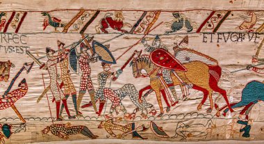 BAYEUX, FRANCE, 14 Mayıs 2024: Bayeux 'nun duvar halısı, 1066 yılındaki Hastings savaşını, İngiltere' nin Norman fethini betimliyor.
