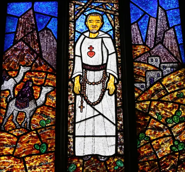 stock image BEUZEVILLE, NORMANDY, FRANCE, MAY 17, 2024 : stained glasses windows in church of Saint-Helier, made by Francois Dorchemont, year 1953