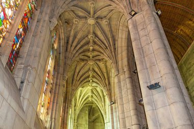 CONCHES-EN-OUCHE, EURE, NORMANDY, FRANCE, MAY 11, 2024 : interiors and architectural details of gothic Church Saint-Foy clipart