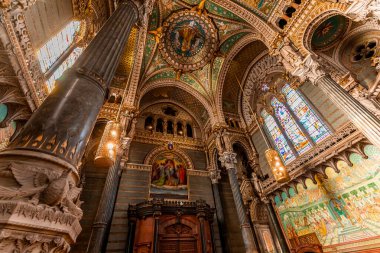 LYON, RHONE, FRANCE, OCTOBER 15, 2024 : interiors and architectural details of Basilica of Notre-Dame de Fourviere clipart