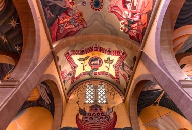 SAINT-MICHEL-DU-VAR, FRANCE, OCTOBER 20, 2024 : architectural details and frescoes by painter Vadim Garine, year 1981, in orthodox church Saint-Seraphin clipart