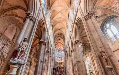 SEMUR-EN-AUXOIS, COTE-D'OR, FRANCE, OCTOBER 29, 2024 : interiors and architectural details of Notre-Dame Collegiate clipart