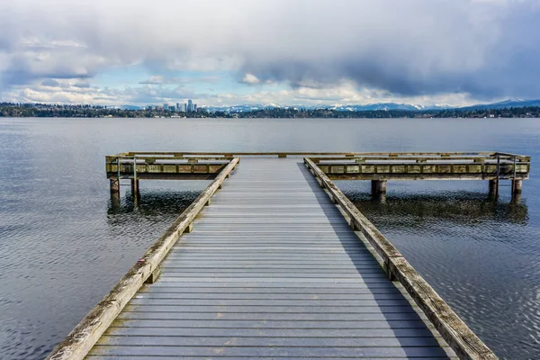 Stock image A view of the skyline of Bellevue, Washington with a pier in the foreground.