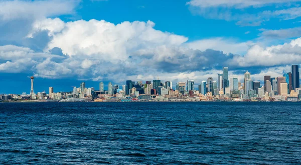 stock image Clouds hang over skyscrapers in the skyline of Seattle, Washington.