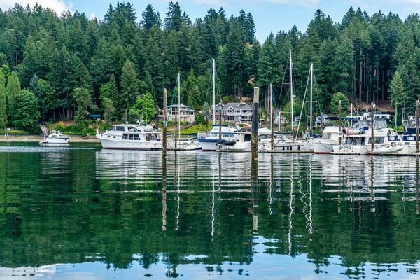 Boats are moored at a marina in Gig Harbor, Washington.