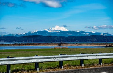 A view of Mount Baker from near Anacotes, Washington. clipart