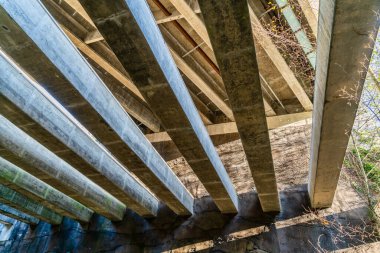 A view from beneath a bridge in Des Moines, Wahington. clipart