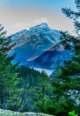 A view of hills and the Skagit River alon Highway 20 in Washington State. clipart