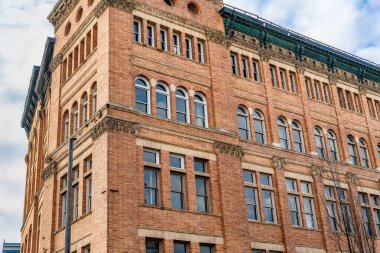 A view of windows on the Old City Hall building in Tacoma, Washington. clipart