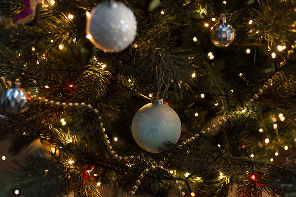 Christmas tree toy, ball on the Christmas tree, lights of garlands, Christmas mood, Happy New Year