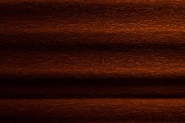 El sanatları için kahverengi krep kağıdının desenli arka planı. Geniş bir arkaplanı olan kıvrımlı kağıt