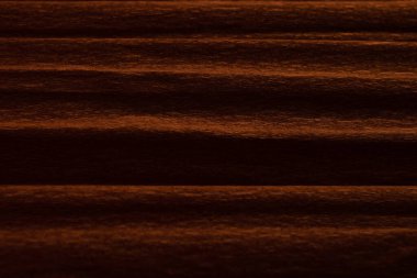 El sanatları için kahverengi krep kağıdının desenli arka planı. Geniş bir arkaplanı olan kıvrımlı kağıt