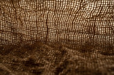 Doğal çuval bezi dokusu, yakın çekim, doğal katlar ve kumaşlar.