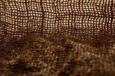 Doğal çuval bezi dokusu, yakın çekim, doğal katlar ve kumaşlar.