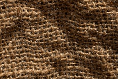 Doğal çuval bezi dokusu, yakın çekim, doğal katlar ve kumaşlar.