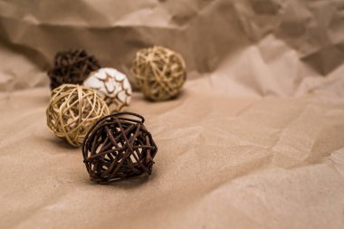 Decorative rattan round balls, on packing paper, with a place for the inscription