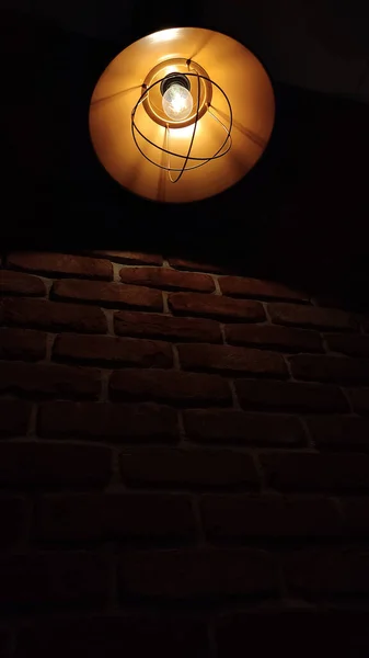 Black Iron Modern Lamp Shines Brick Wall Red Brick Wall — Stock Photo, Image
