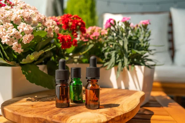 Bottles Essential Oils Natural Cosmetics Skin Care Bottle Flowers Pot — Stock Photo, Image