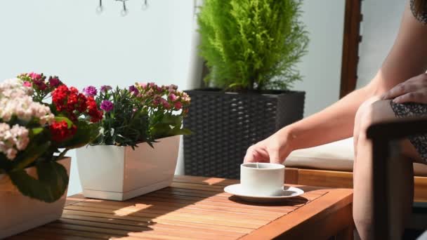 Woman Sitting Terrace Wooden Furniture Brewing Tea Tea Bag Boiling — Stockvideo