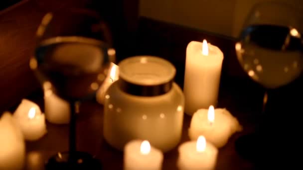 Burning Candles Dark Two Glasses Wine Focus First Candles Goes — Vídeo de Stock