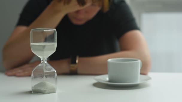 Time Passes Hourglass Psychologically Depressed Woman Sits Rubs Her Face — Stock Video