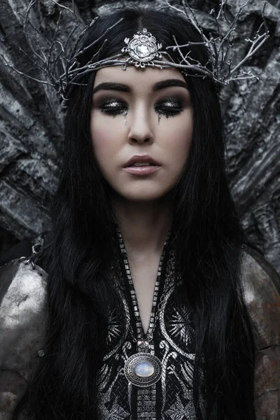 stock image Beautiful warrior princess in armor. Fantasy knight black haired woman wearing wreath. Fairy tale gothic queen.