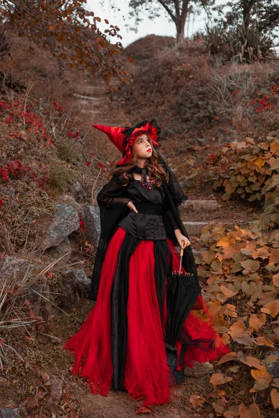 Little Girl Witch Black Red Dress Pointed Hat Standing Front — Stock Photo, Image