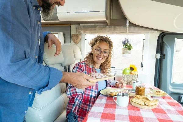 Kind Husband Man Serving Food His Wife Camper Home Woman — Stockfoto