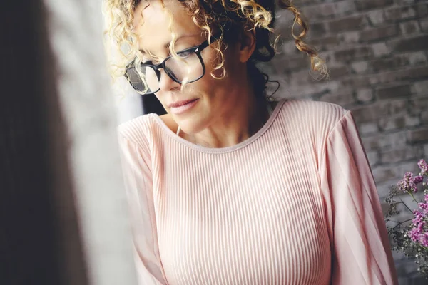 Portrait Thoughtful Adult Woman Home Window Wearing Glasses Little Smile — Stock Photo, Image