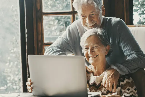 Old Senior Couple Home Use Laptop Video Call Friends Parents —  Fotos de Stock